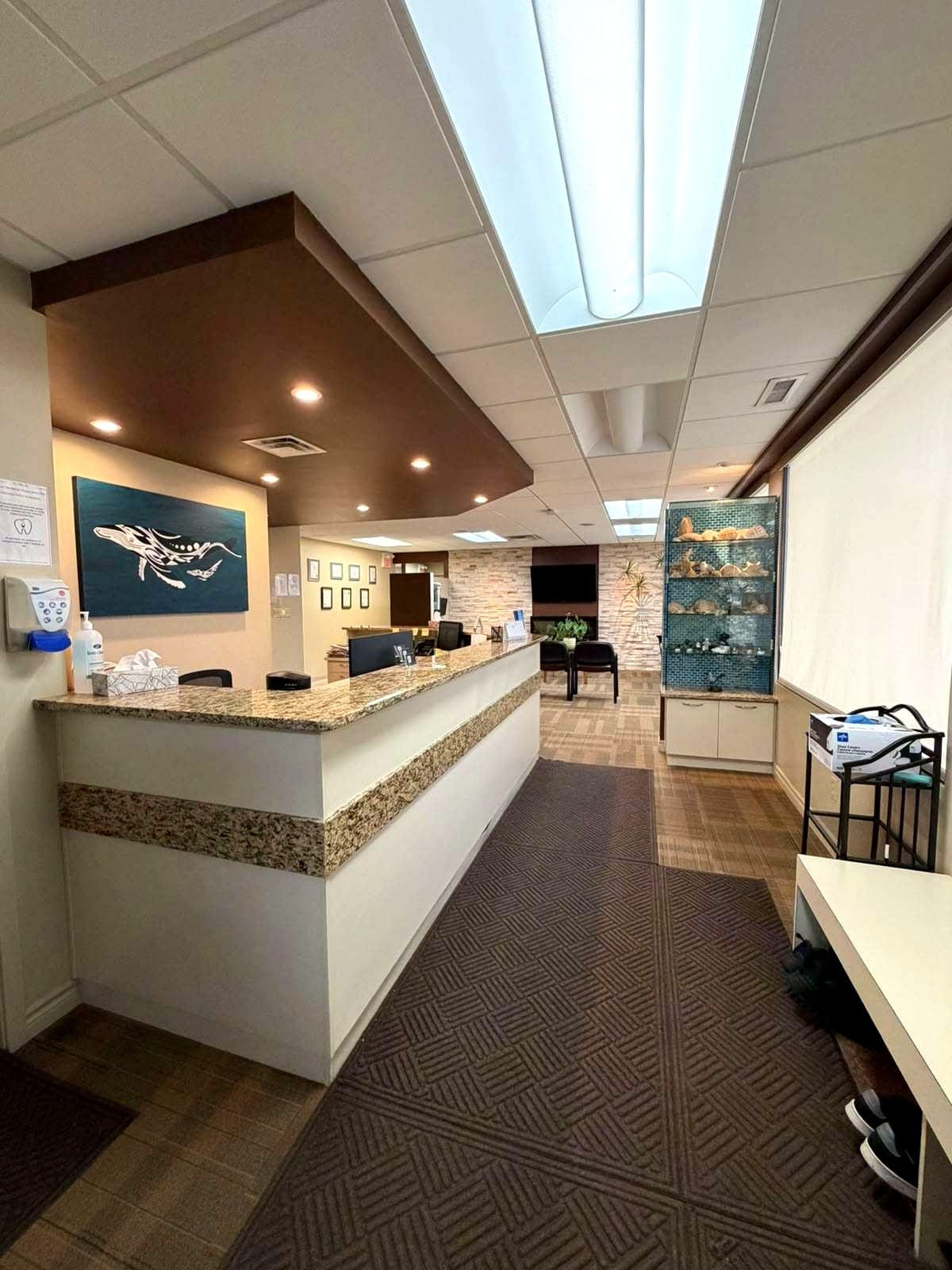 Reception counter and waiting lounge with warm feature lighting